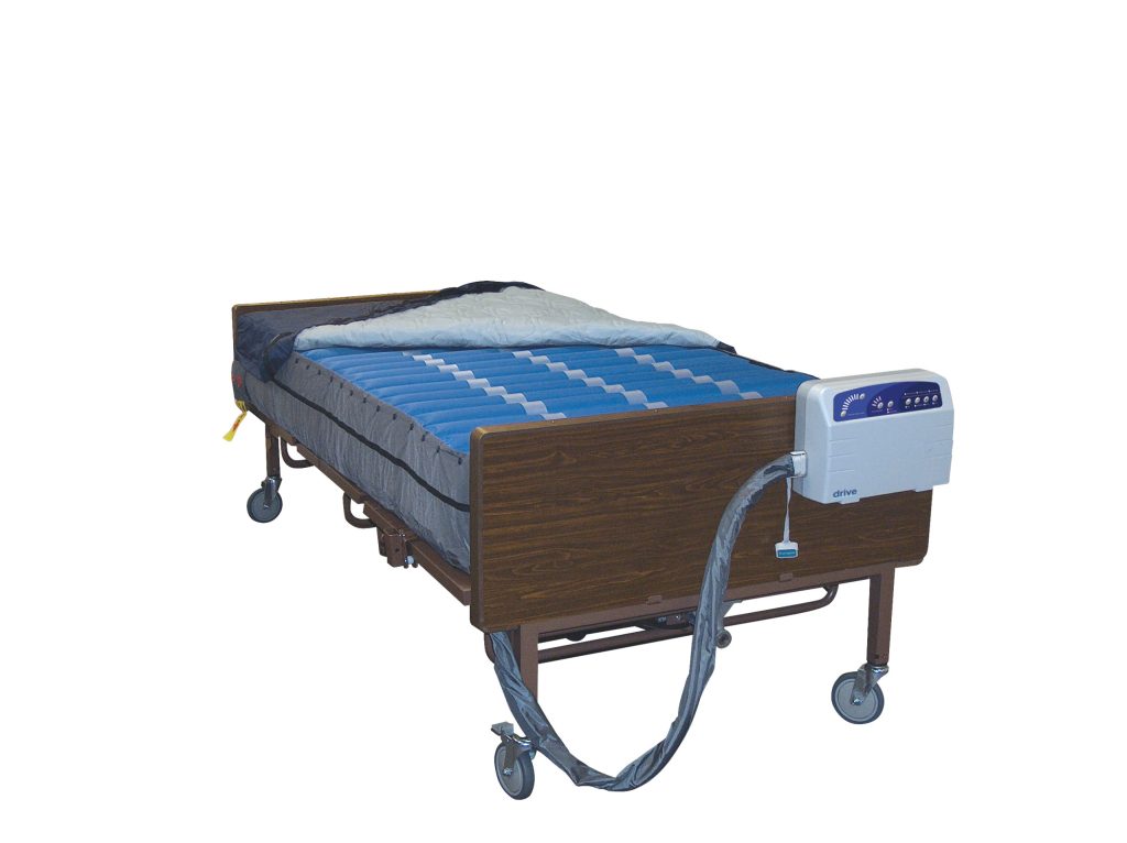 Hospital bed with air loss mattress